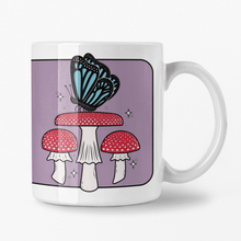 Laden Sie das Bild in den Galerie-Viewer, Blue Butterfly with Fly Agaric Mushrooms | Mushroom Pals | Ceramic Mug - Scaredy Cat Studio
